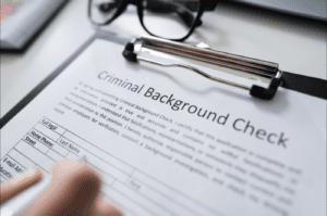 Image of a paper saying "Criminal Background Check"