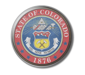 Image of Colorado State Seal; it says "State of Colorado" and 1876