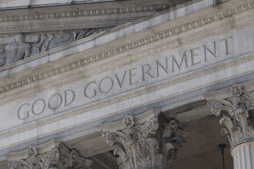 Image of the words "good government" in front of what looks like a capital building.